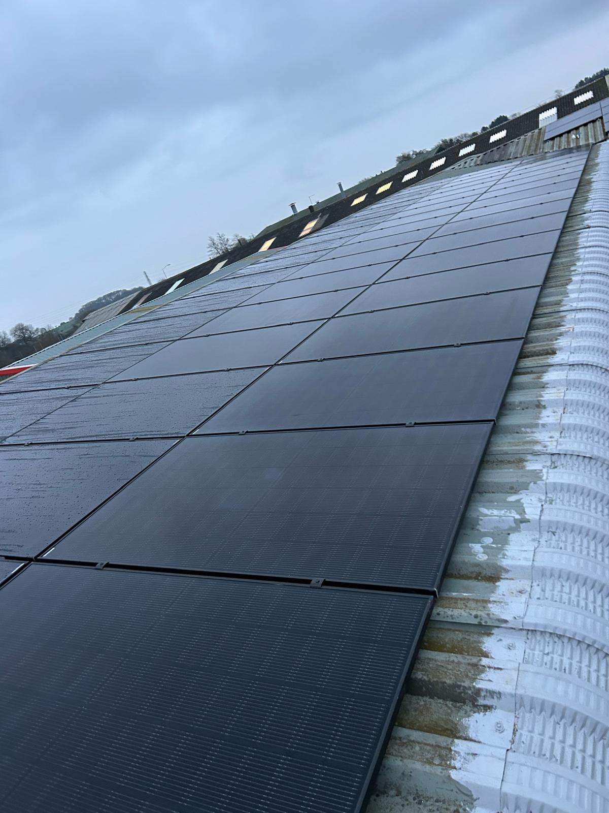 Solar panels installed on a warehouse roof